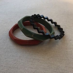 Red, green, and black wooden bangles
